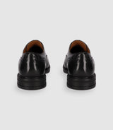 Black leather town shoes