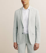 Costume with light green pockets