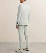 Costume with light green pockets