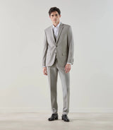 Two-button suit in taupe-colored wool.