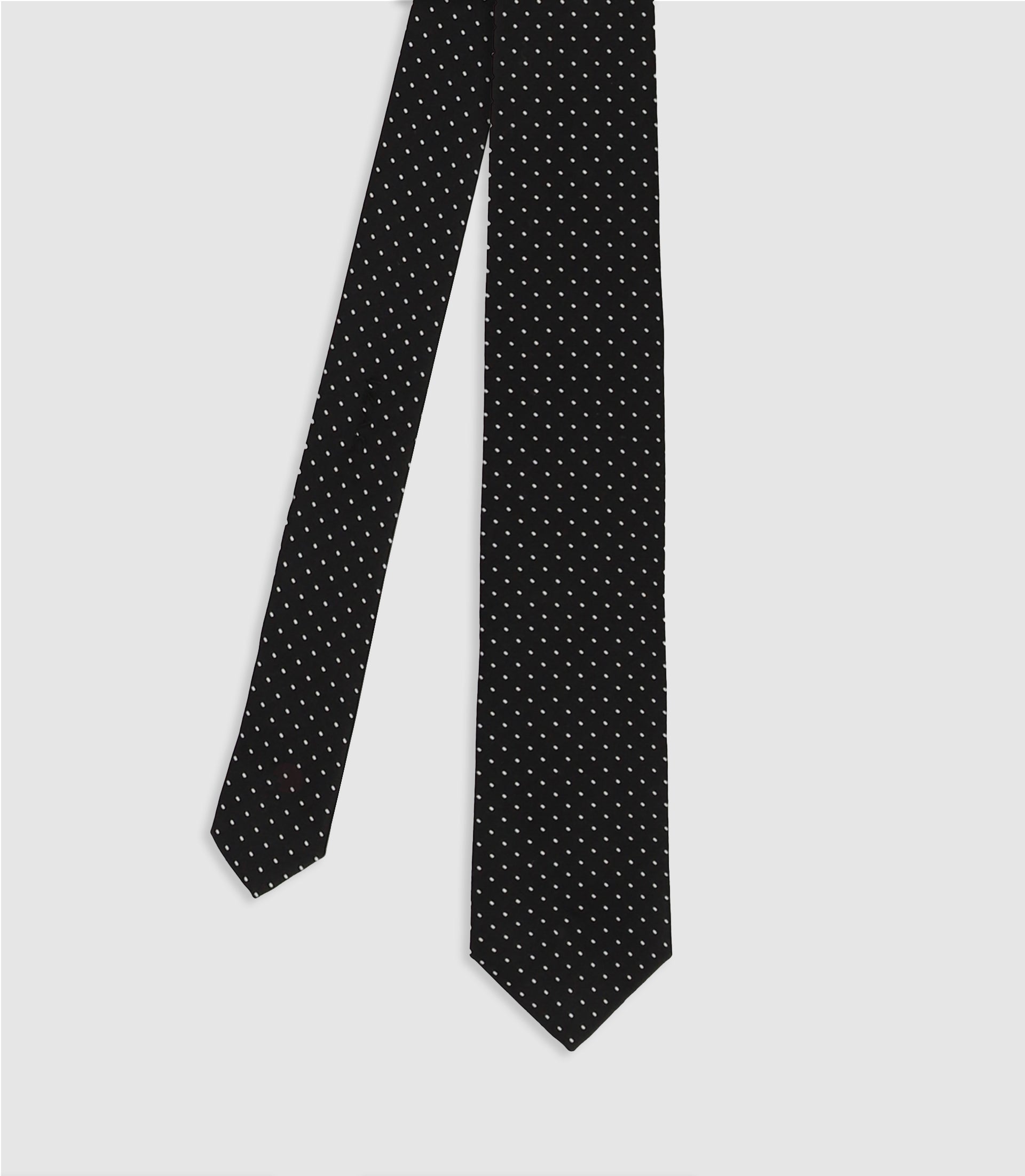 Black polka dot tie