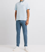 Polo with sky blue embroidery