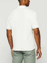 Polo uni en maille fantaisie blanc GEORGE