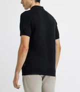 Polo with black zipped neck