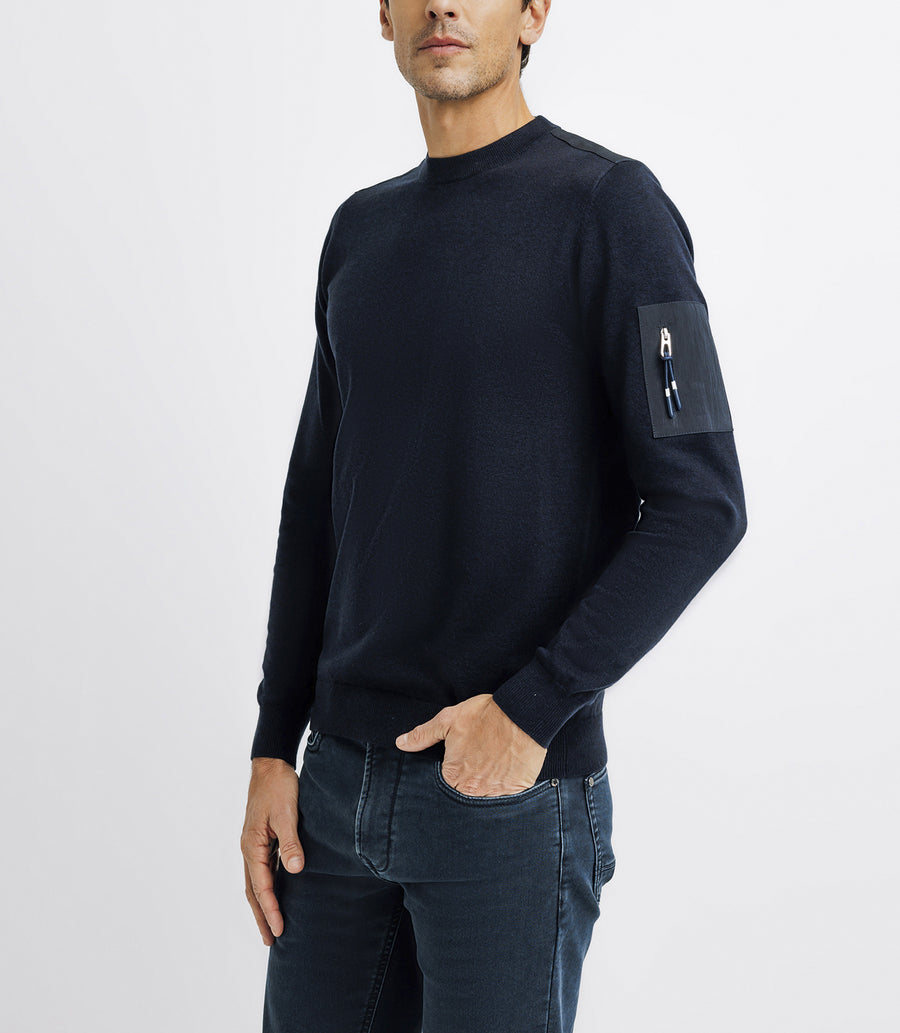 Pull col rond avec poche marine