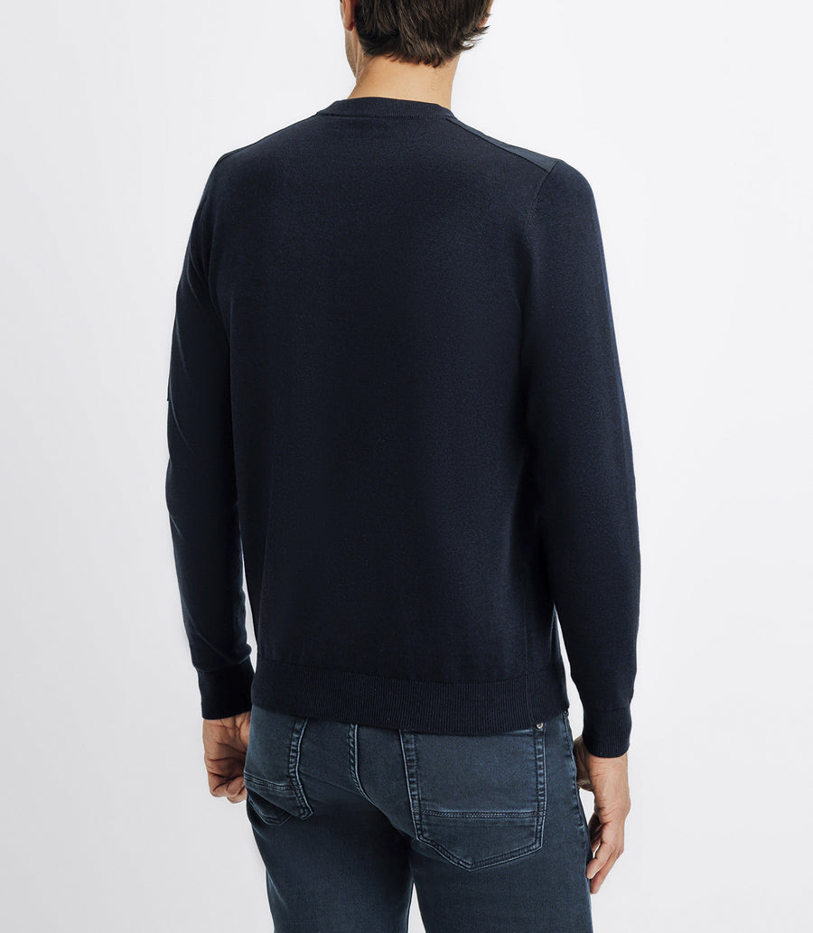 Pull col rond avec poche marine