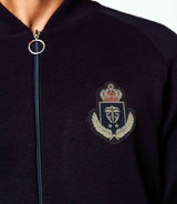 Zipped vest with teddy neck and coat of arms