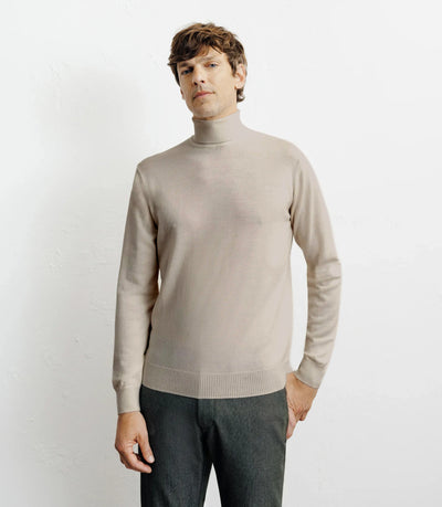 Pull col roulé en laine mérinos beige