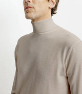 Pull col roulé en laine mérinos beige