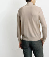 Pull col roulé en laine mérinos beige