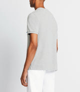 T-shirt with gray zipped pocket