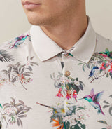 Rebel" beige polo shirt with tropical pattern