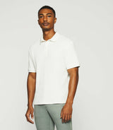 Polo uni en maille fantaisie blanc GEORGE - IZAC